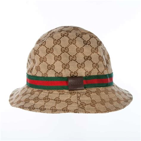 gucci bucket hat song meaning.